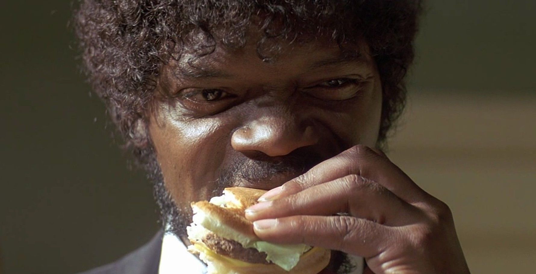 Jules easts the Big Kahuna Burger in Pulp Fiction