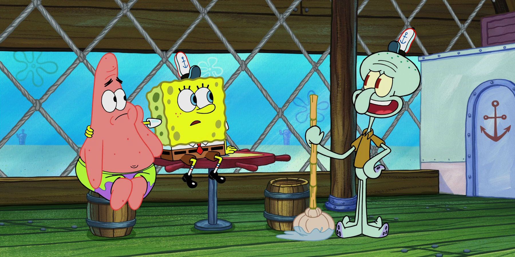 Squidward talking to SpoingeBob and Patrick.