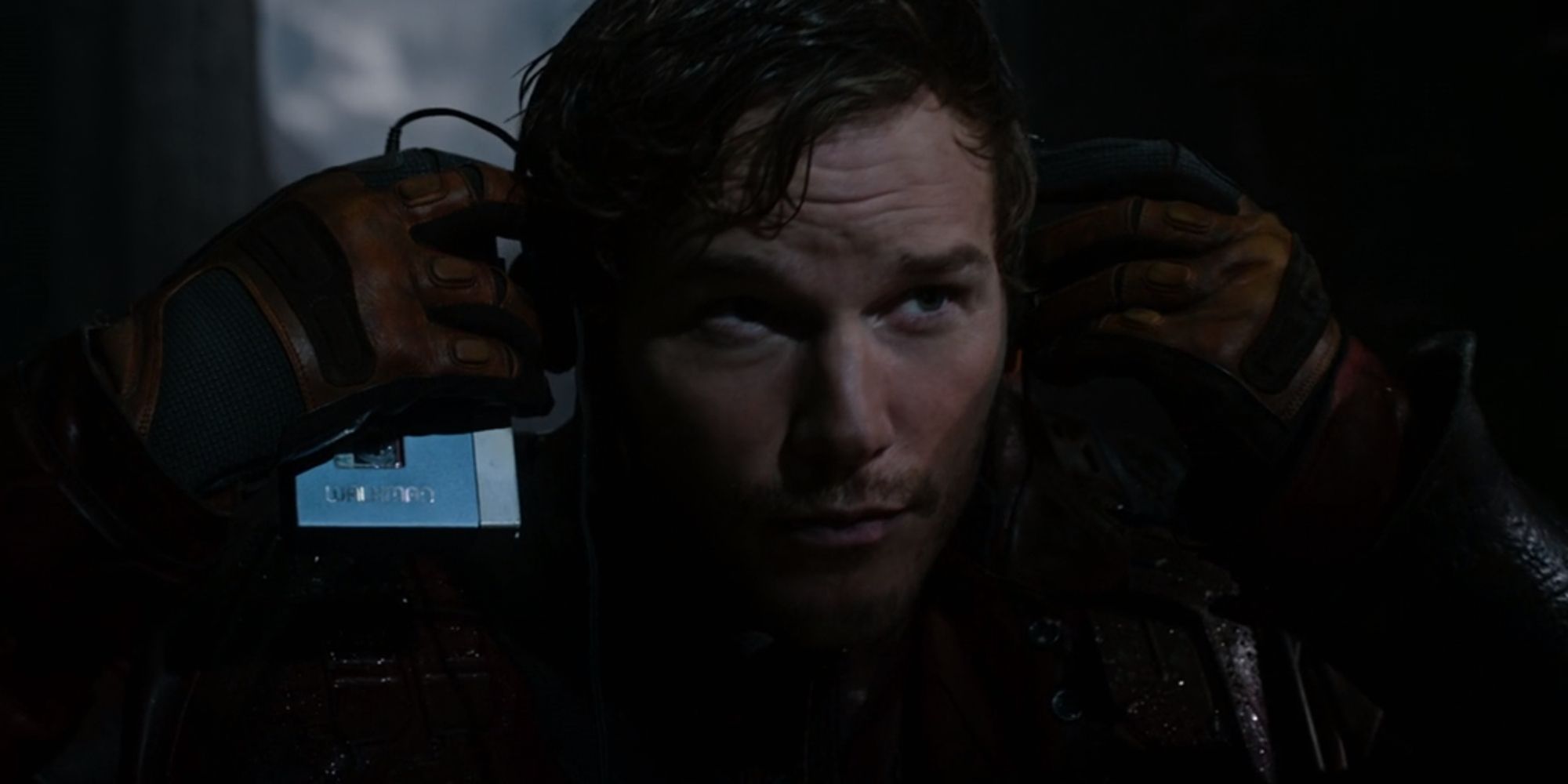 Star Lord putting on his headphones for the first time in Guardians Of The