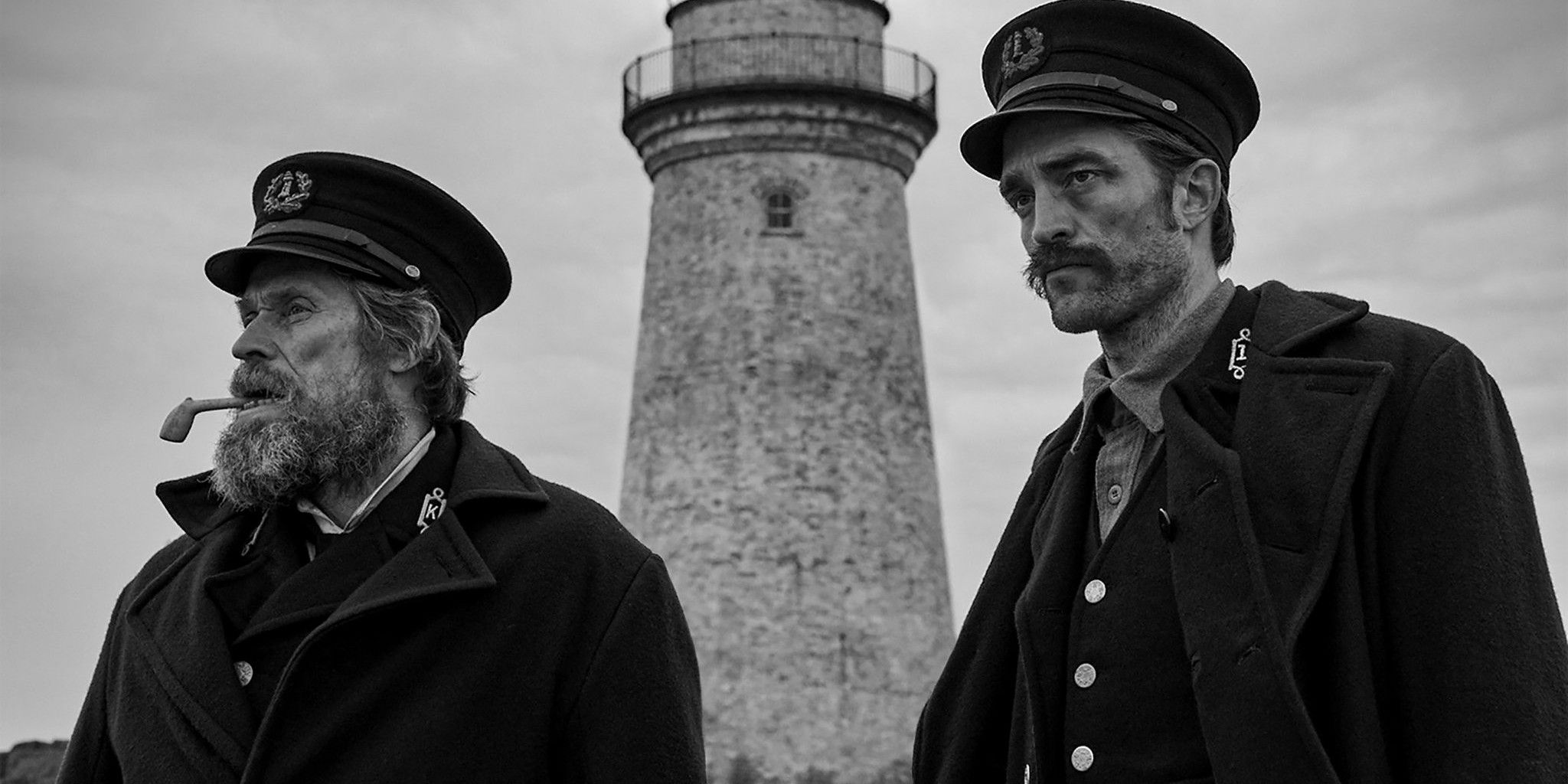 Thomas and Ephraim outsie the lighthouse in The Lighthouse 2019.