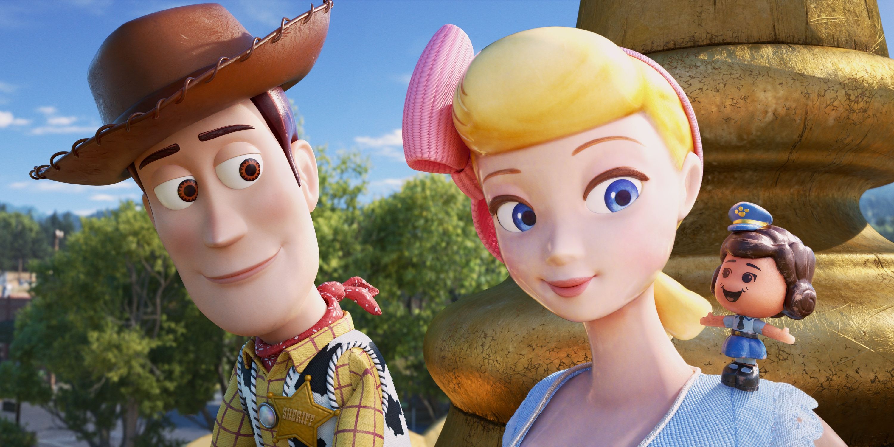 Woody and Bo Peep in Toy Story 4 sitting on a fountain