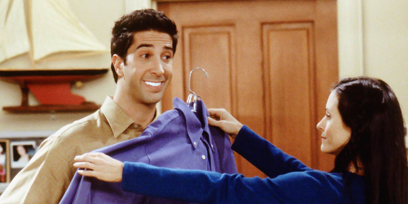 Ross smiles and shows his white teeth in Friends