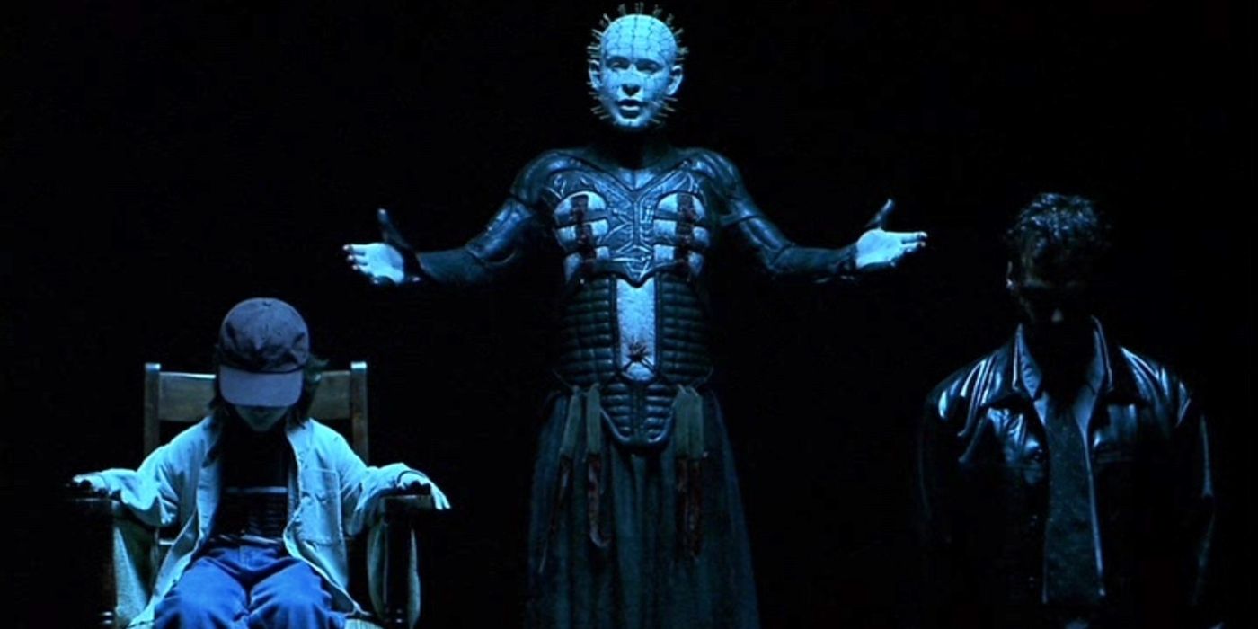 Pinhead with two prisoners in Hellraiser Inferno.