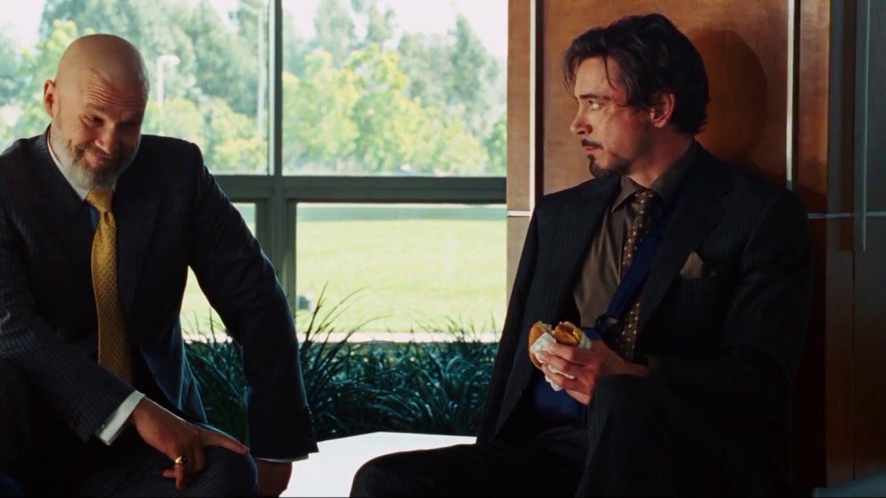 iron man eating a cheeseburger