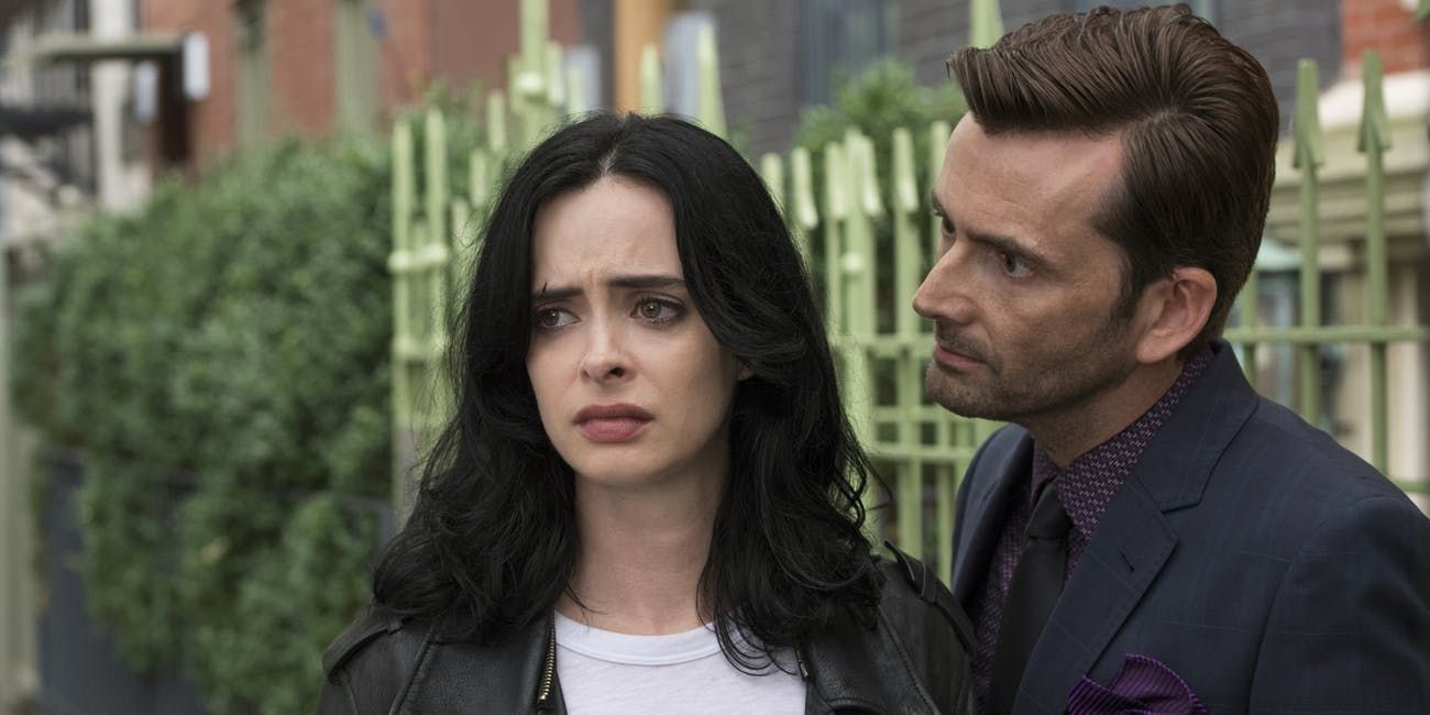 Kilgrave whispers behind Jessica in Jessica Jones