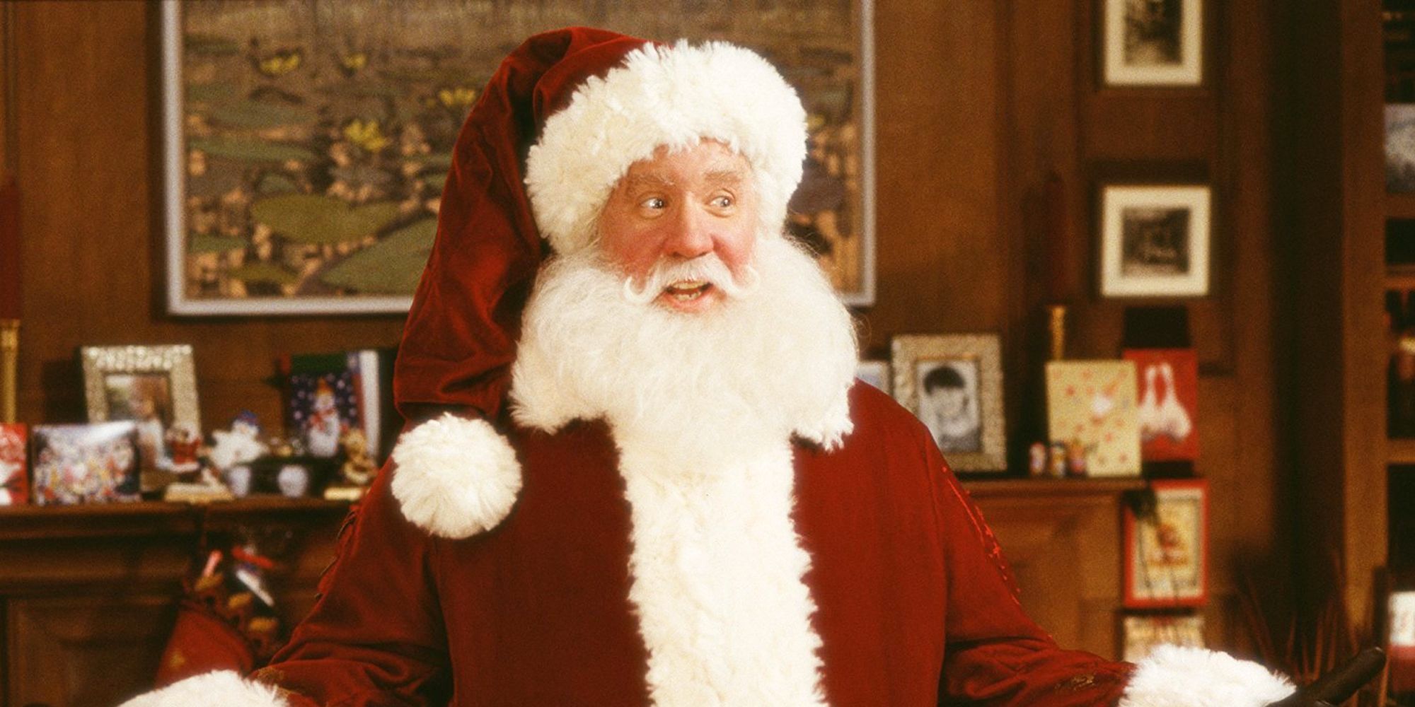 Santa Clause standing inside someone's home in The Santa Clause