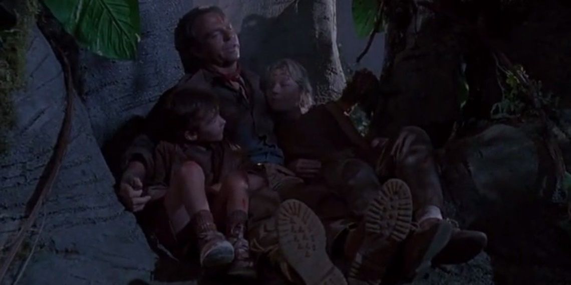Alan, Lex, and Tim relax in a tree for the night in Jurassic Park