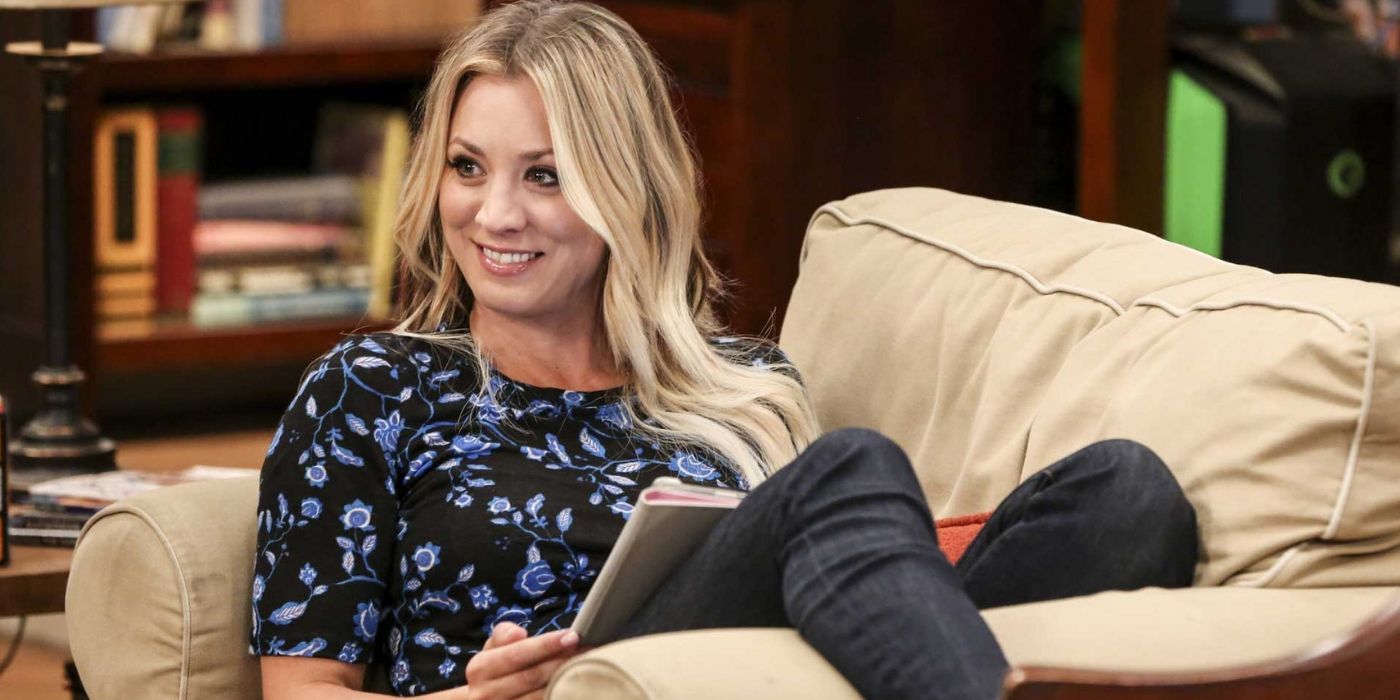 Penny on the couch smiling in TBBT