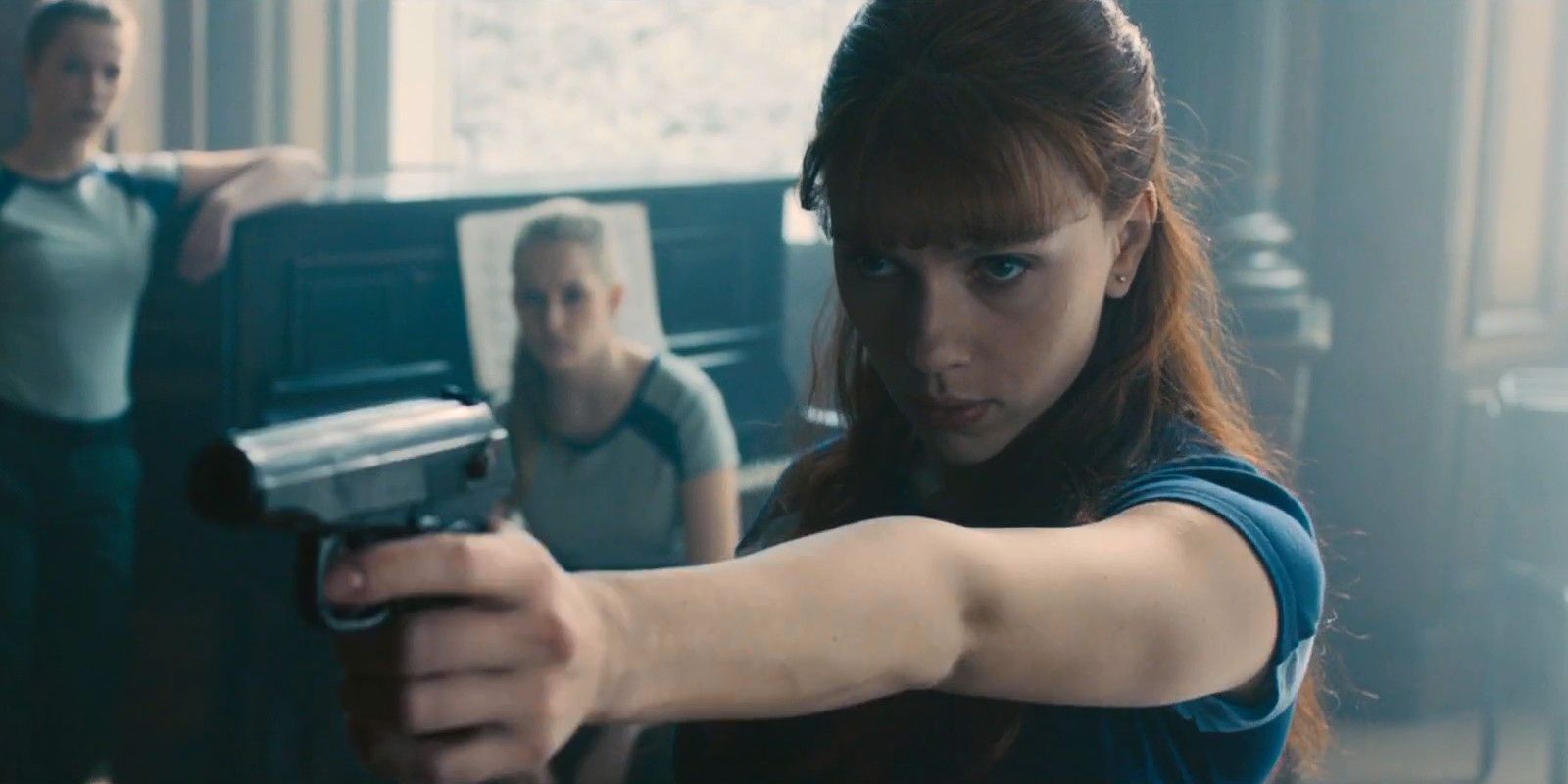 Black Widow and her vision as she aims a gun in the Red Room in Avengers: Age of Ultron