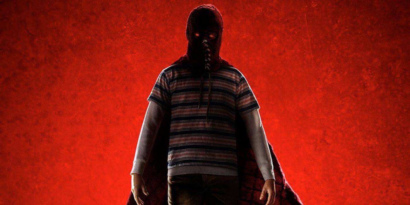 The young masked kid with glowing red eyes in Brightburn's poster