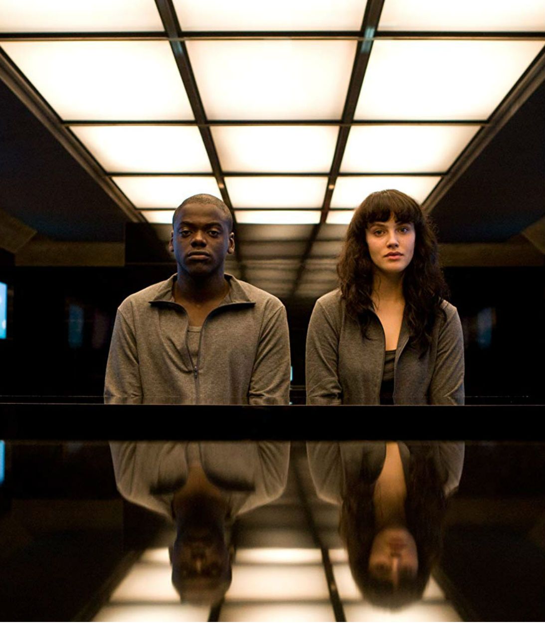 Daniel Kaluuya and Jessica Brown Findlay in Black Mirror Fifteen Million Merits Vertical