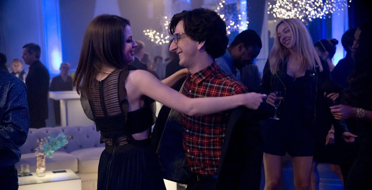 Gillian Jacobs and Paul Rust dancing in Love