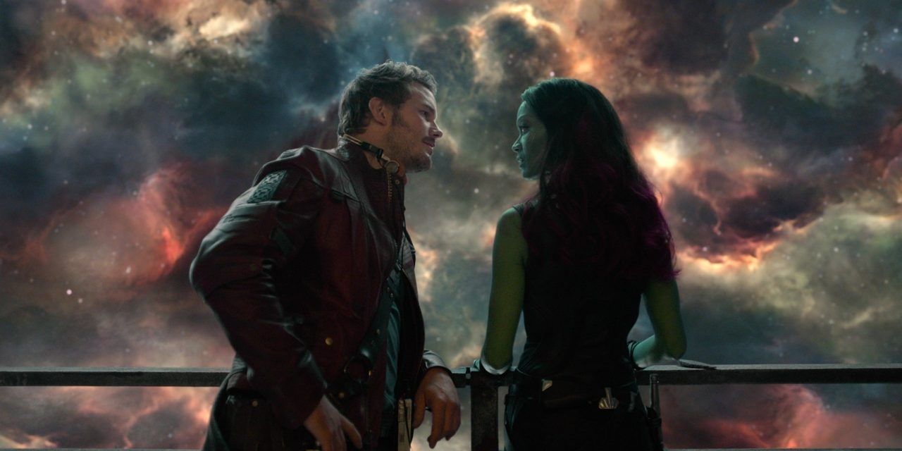 Peter and Gamora lean on a balcony in Guardians of the Galaxy