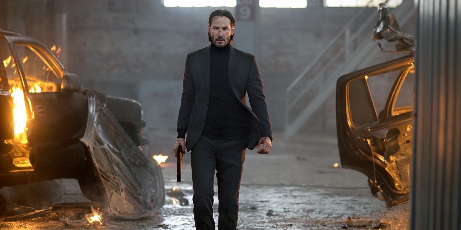 Keanu Reeves in a warehouse in John Wick (2014)