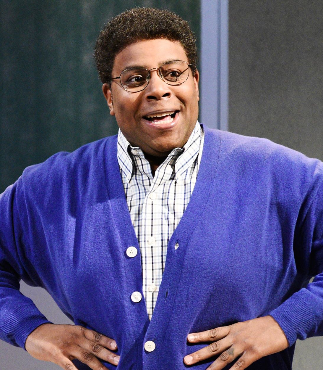Kenan Thompson in a sweater vertical