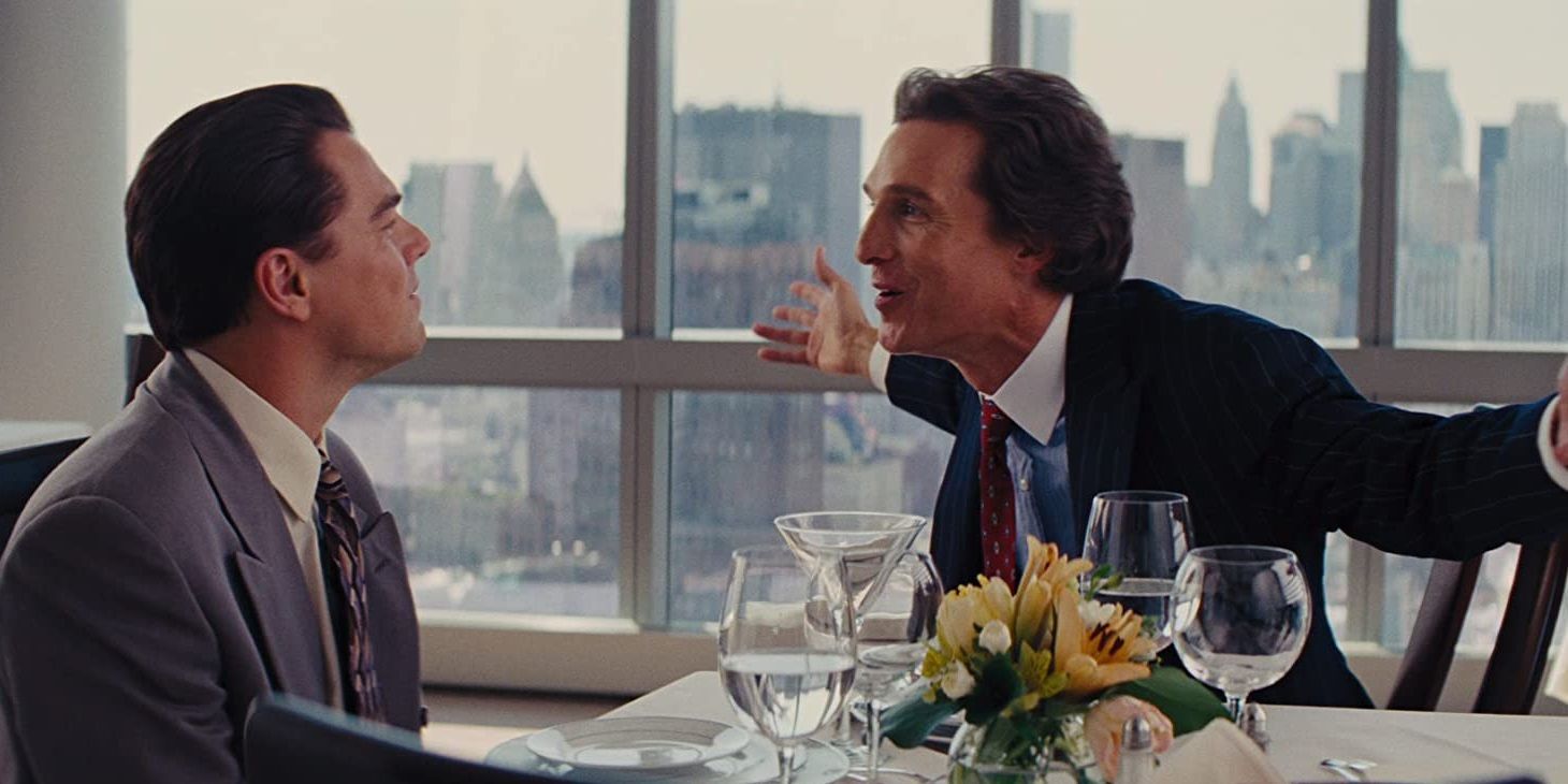 Leonardo DiCaprio and Matthew McConaughey in a restaurant in The Wolf of Wall Street