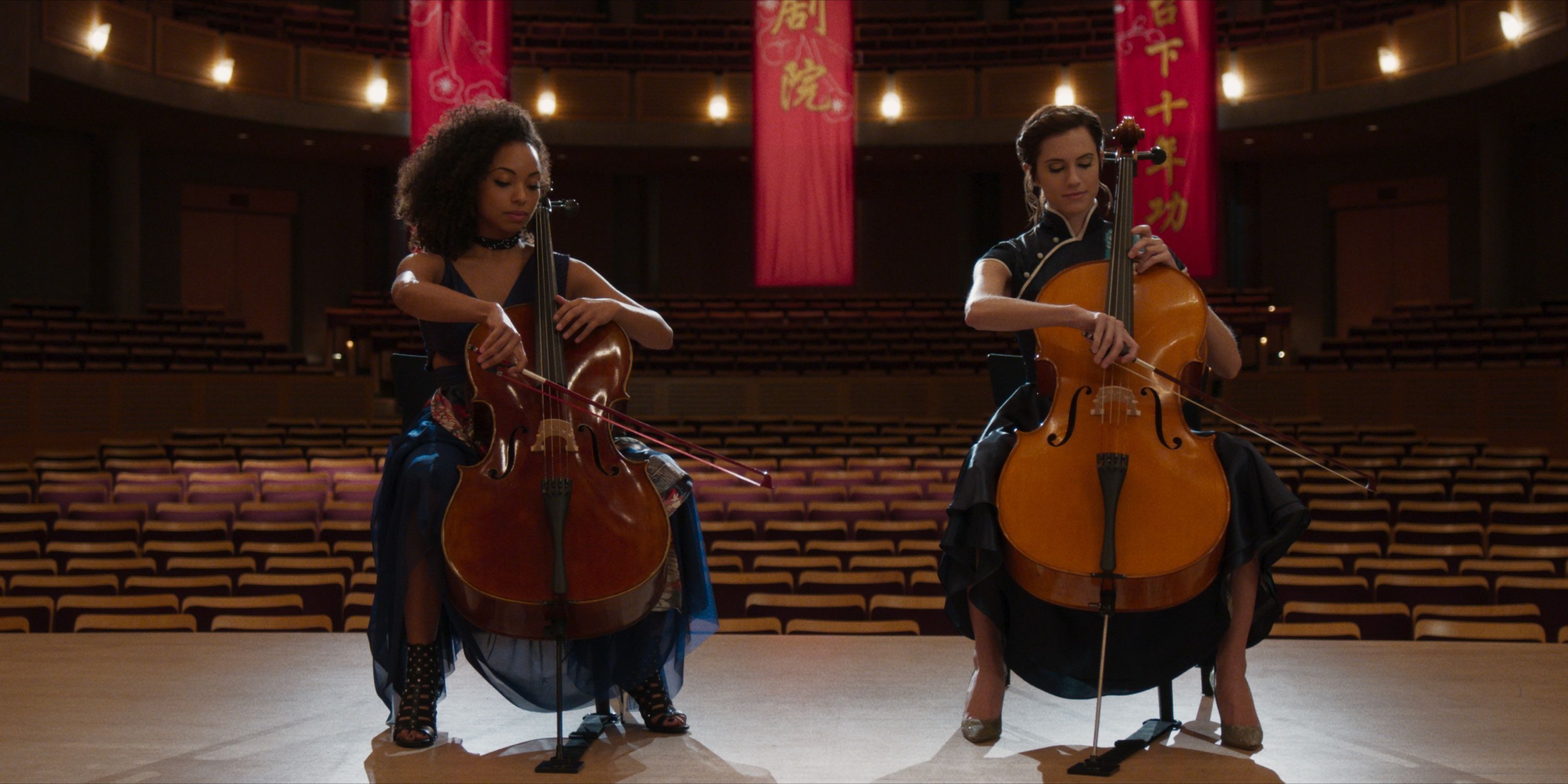 Charlotte and Lizzie playing cello in The Perfection