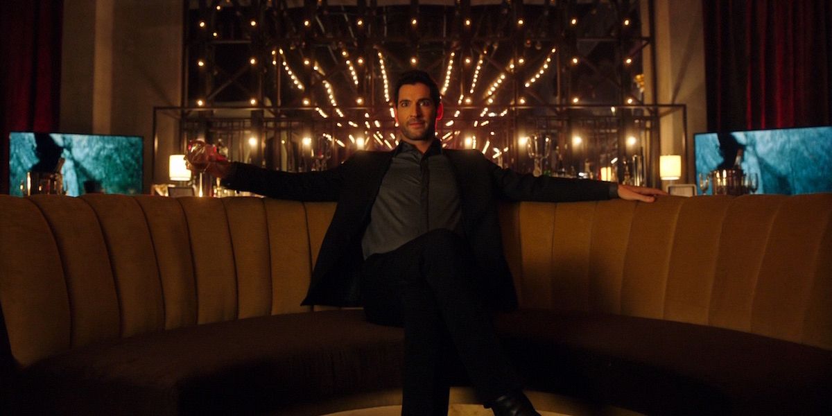Lucifer sits in a booth at Lux in Lucifer