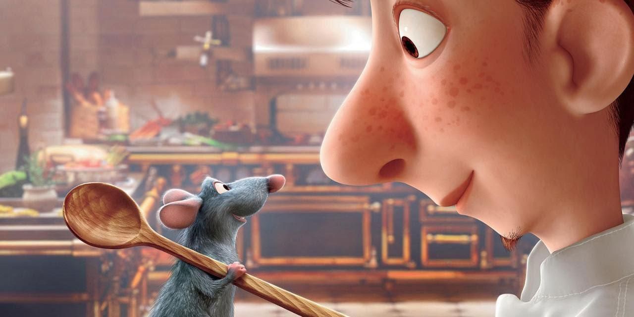 Remy e Linguini sorriem um para o outro na cozinha em Ratatouille da Pixar