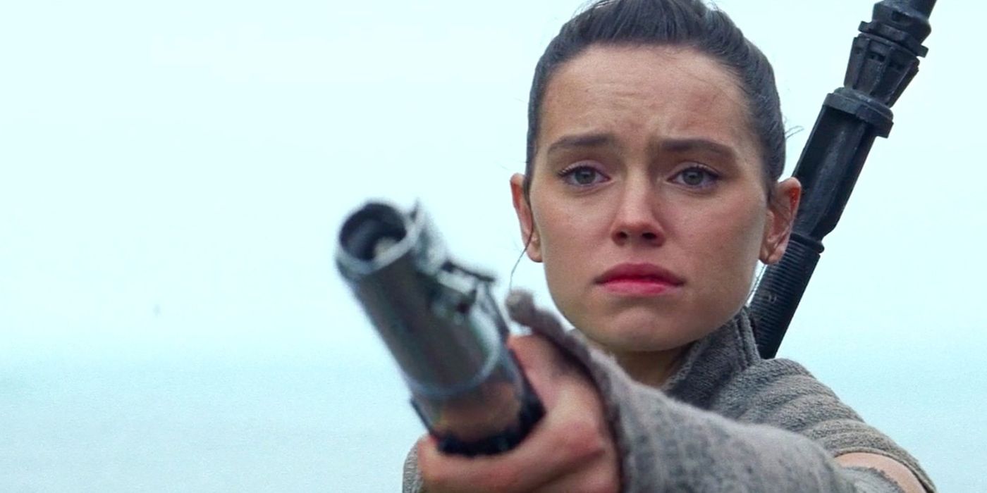 Rey with a lightsaber in Last Jedi.