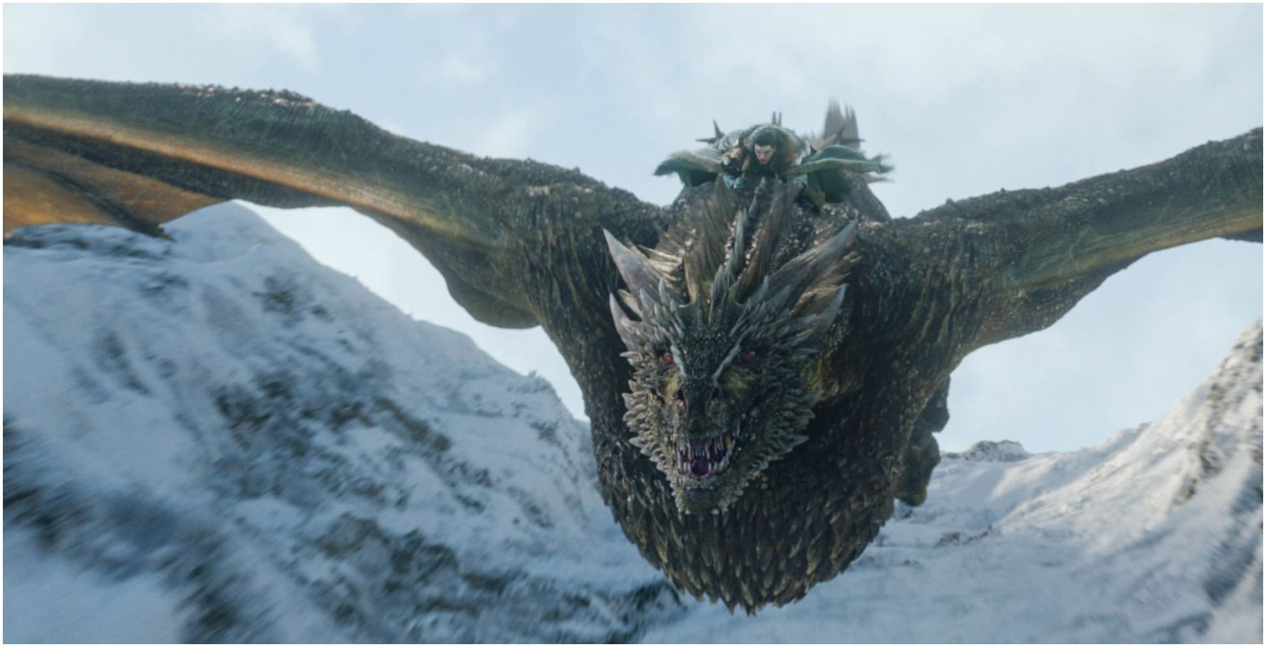 Rhaegal flying with Jon Snow