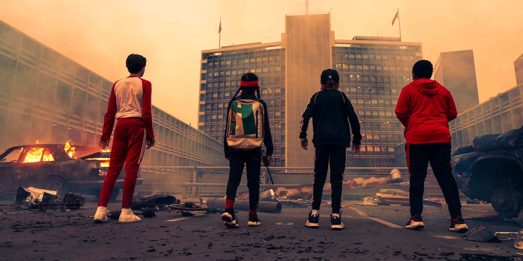 Alessio Scalzotto&rsquo;s Gabriel Miya Cech&rsquo;s ZhenZhen Jack Gore&rsquo;s Alex and Benjamin Flores Jr&rsquo;s Dariush all stare at a smoky building in Rim of the World
