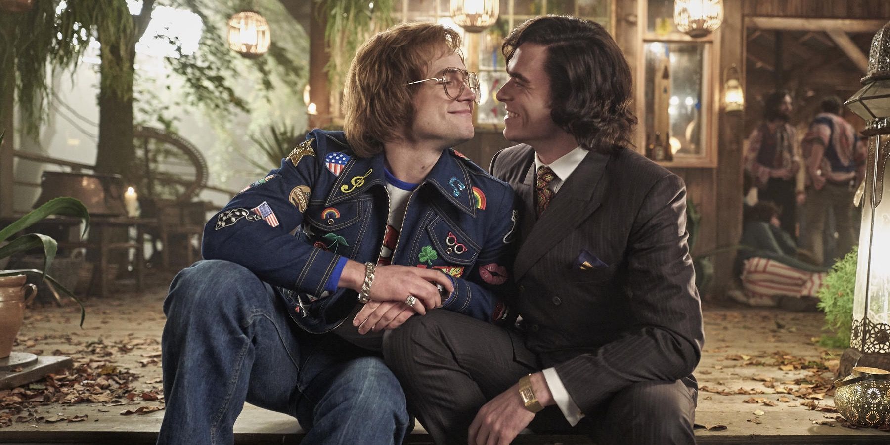 Elton John and Reid look at each other lovingly in Rocketman