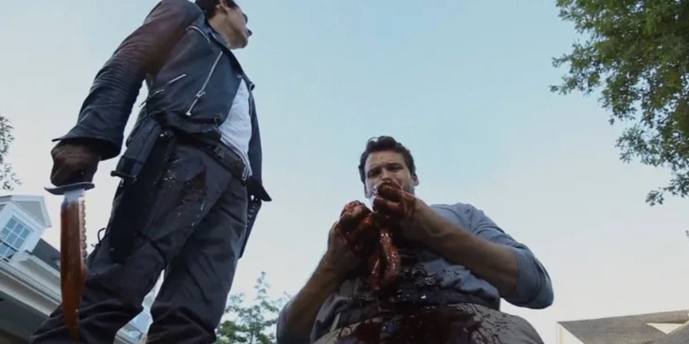 Spencer holding his guts in The Walking Dead