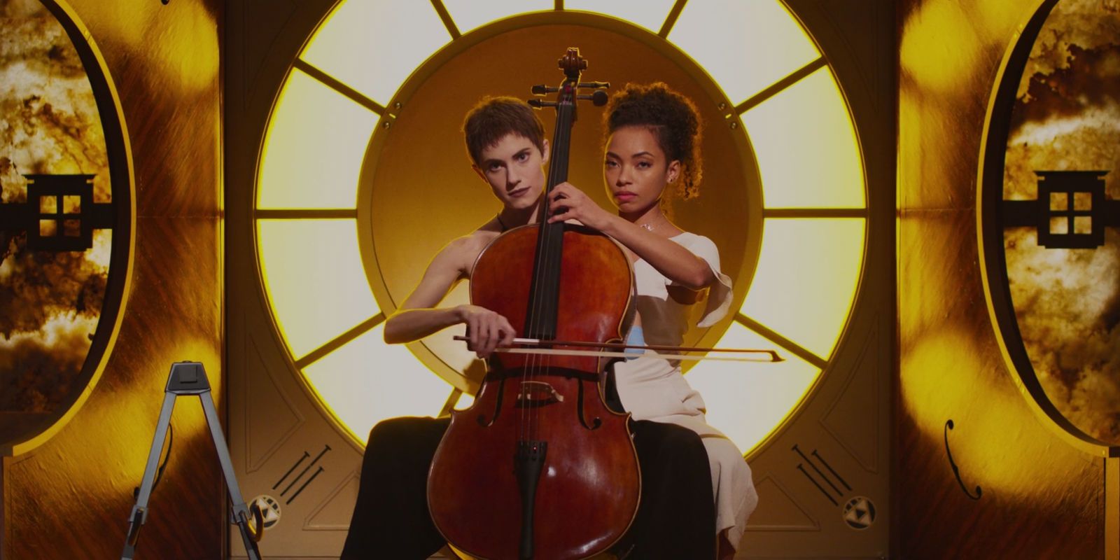 Two people play the cello together in The Perfection