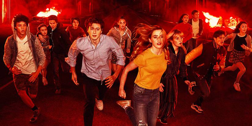 The cast of Netflix's The Society running away from fire.