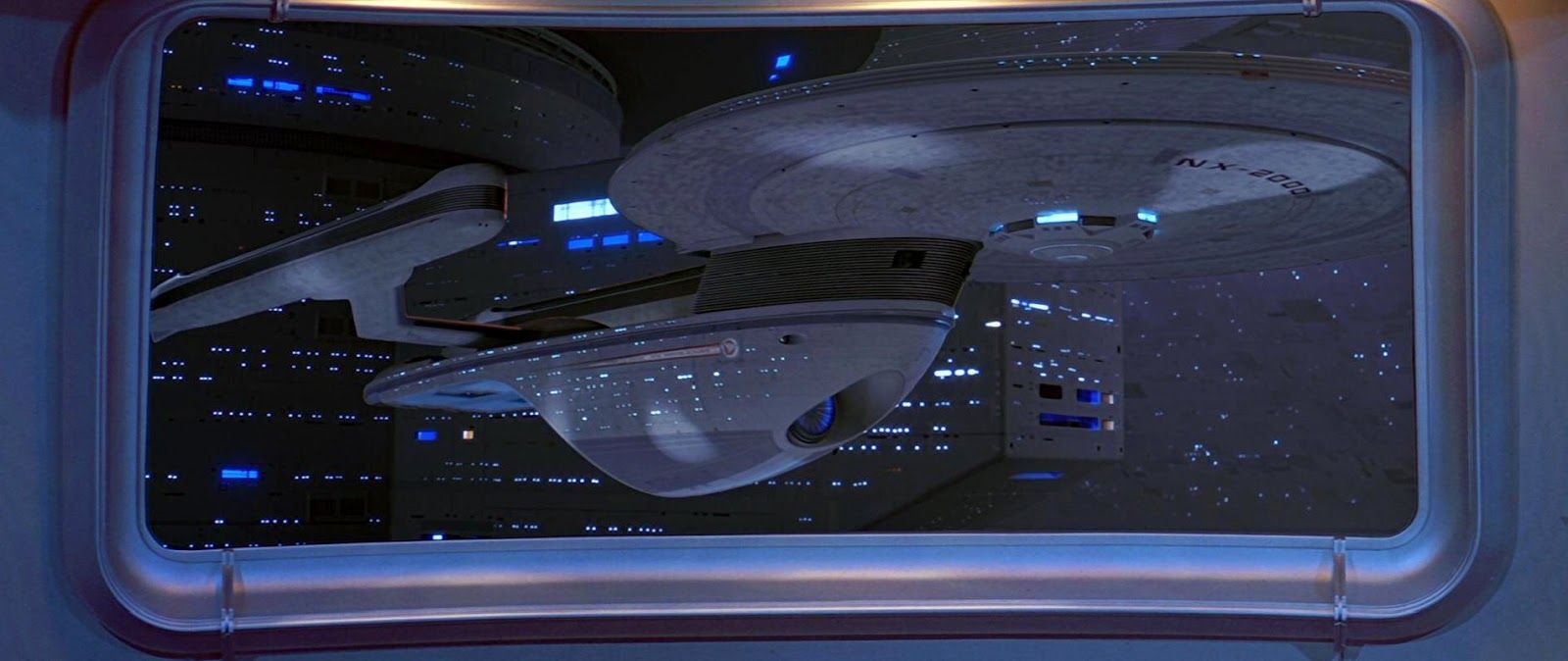 A picture of Star Trek's USS Excelsior in space dock is shown.