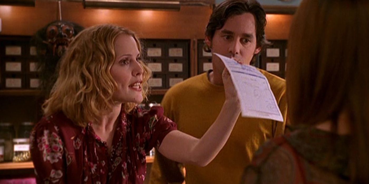 Anya showing a receipt at the Magic Box in Buffy the Vampire Slayer