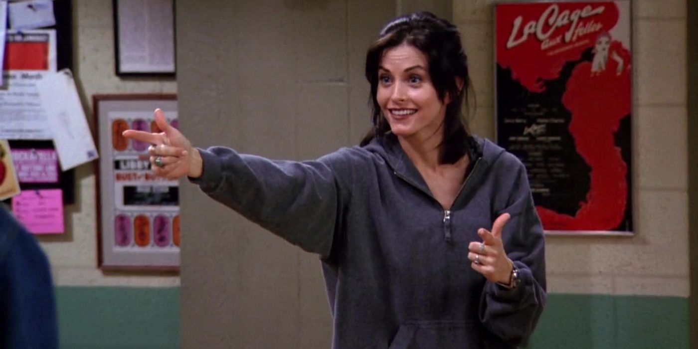 Monica grins and points in Friends