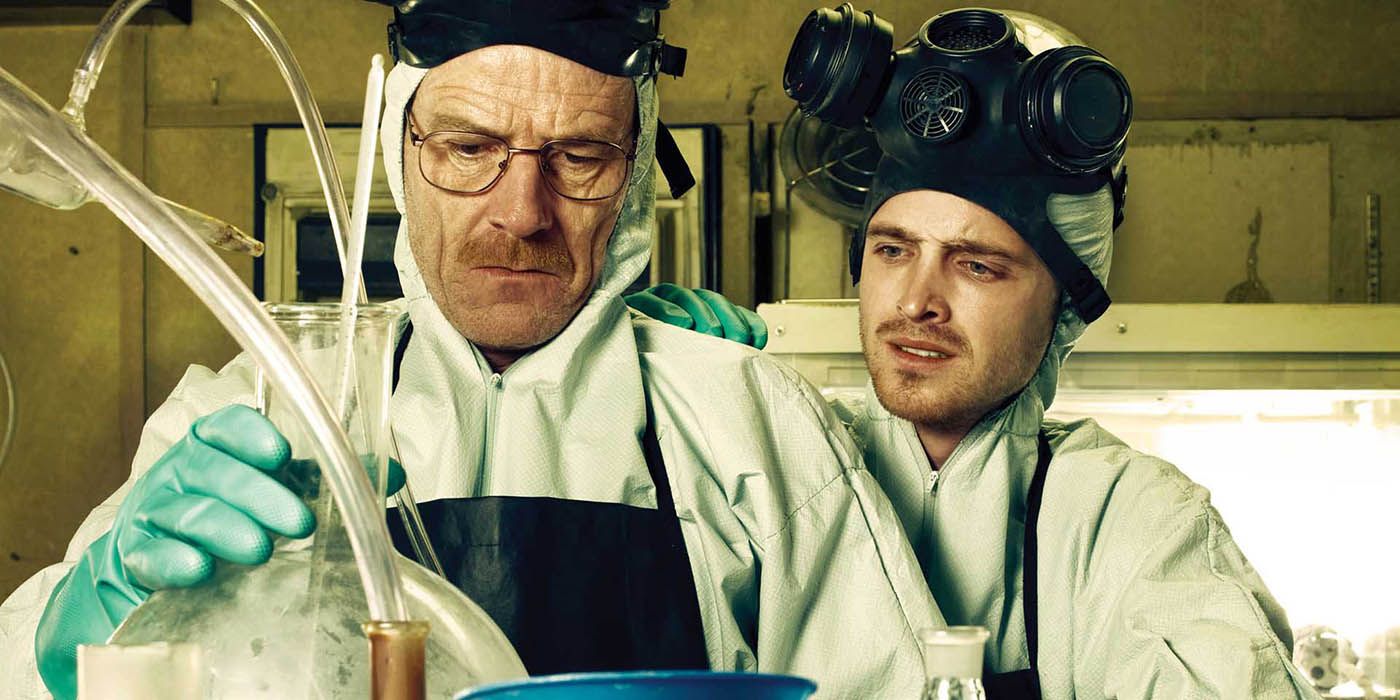 jesse pinkman looking over Walter White's shoulder while they make Meth