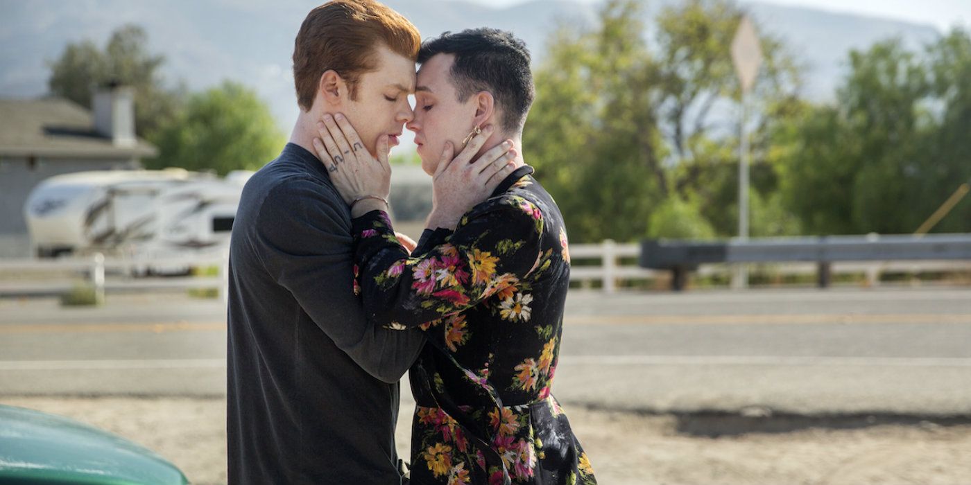 Ian and Mickey embrace in Shameless