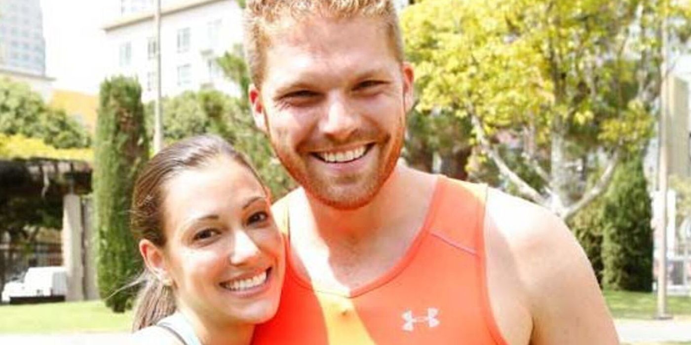 Brooke and Scott smiling and posing for a photo in The Amazing Race