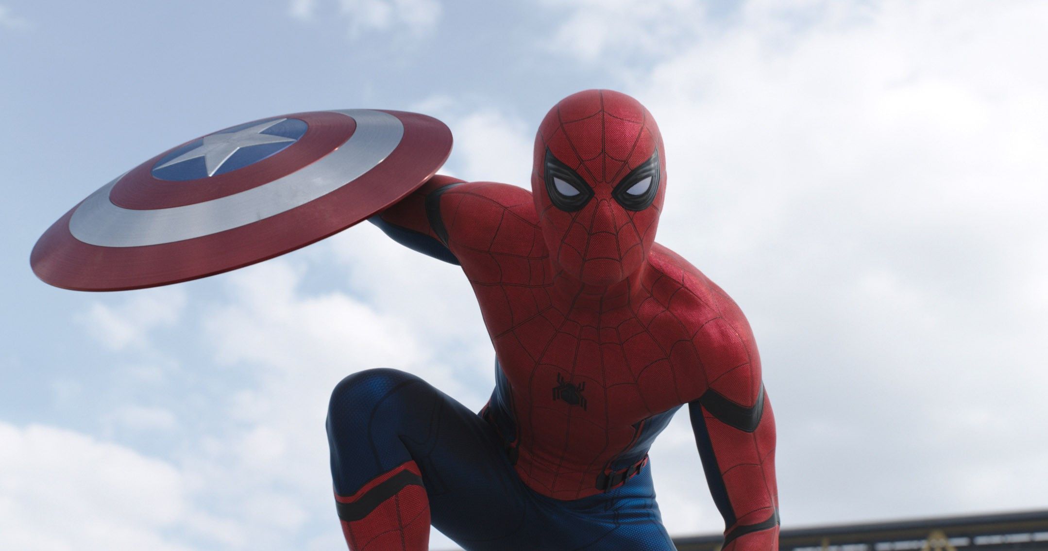 Spider-Man holding Captain America's shield in Captain America: Civil War