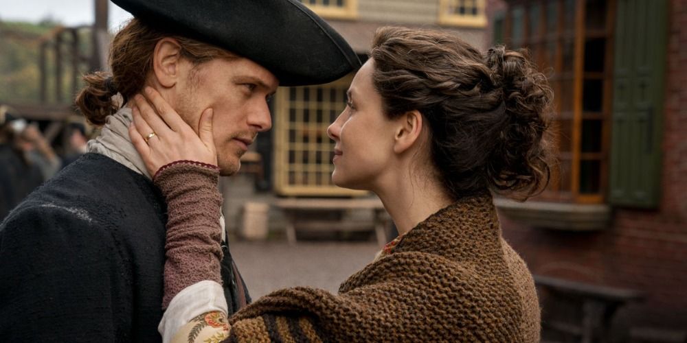 An image of Claire touching Jamie&rsquo;s face in Outlander