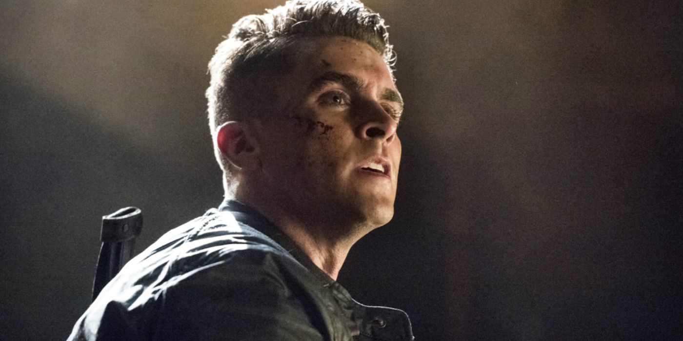 Adrian Chase looking to the distance in Arrow