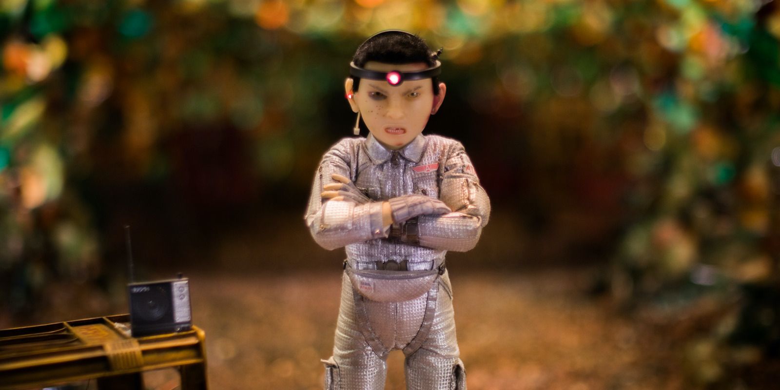 Atari from Isle of Dogs with arms crossed