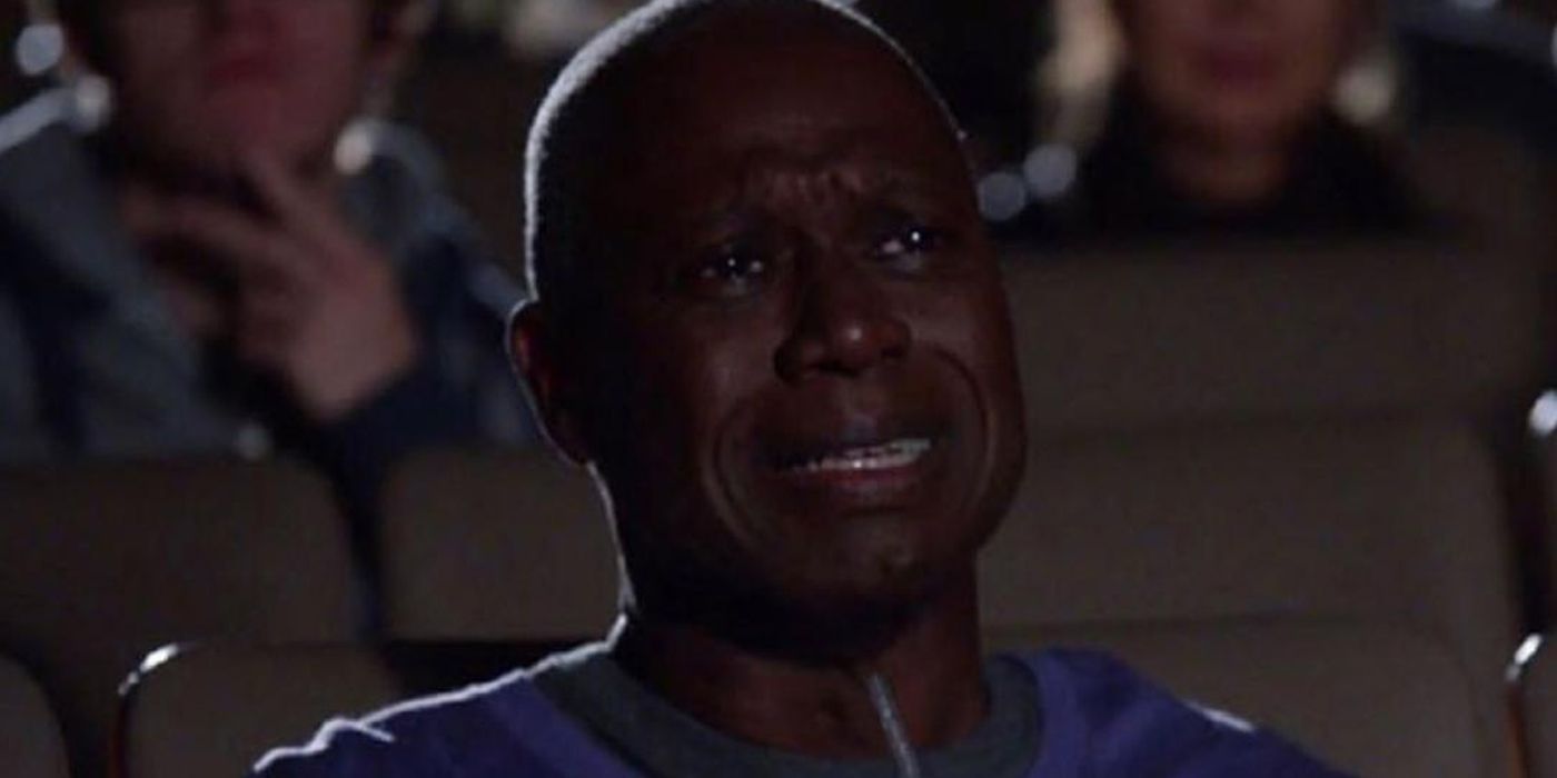 Captain Holt crying while watching Moneyball in a theater