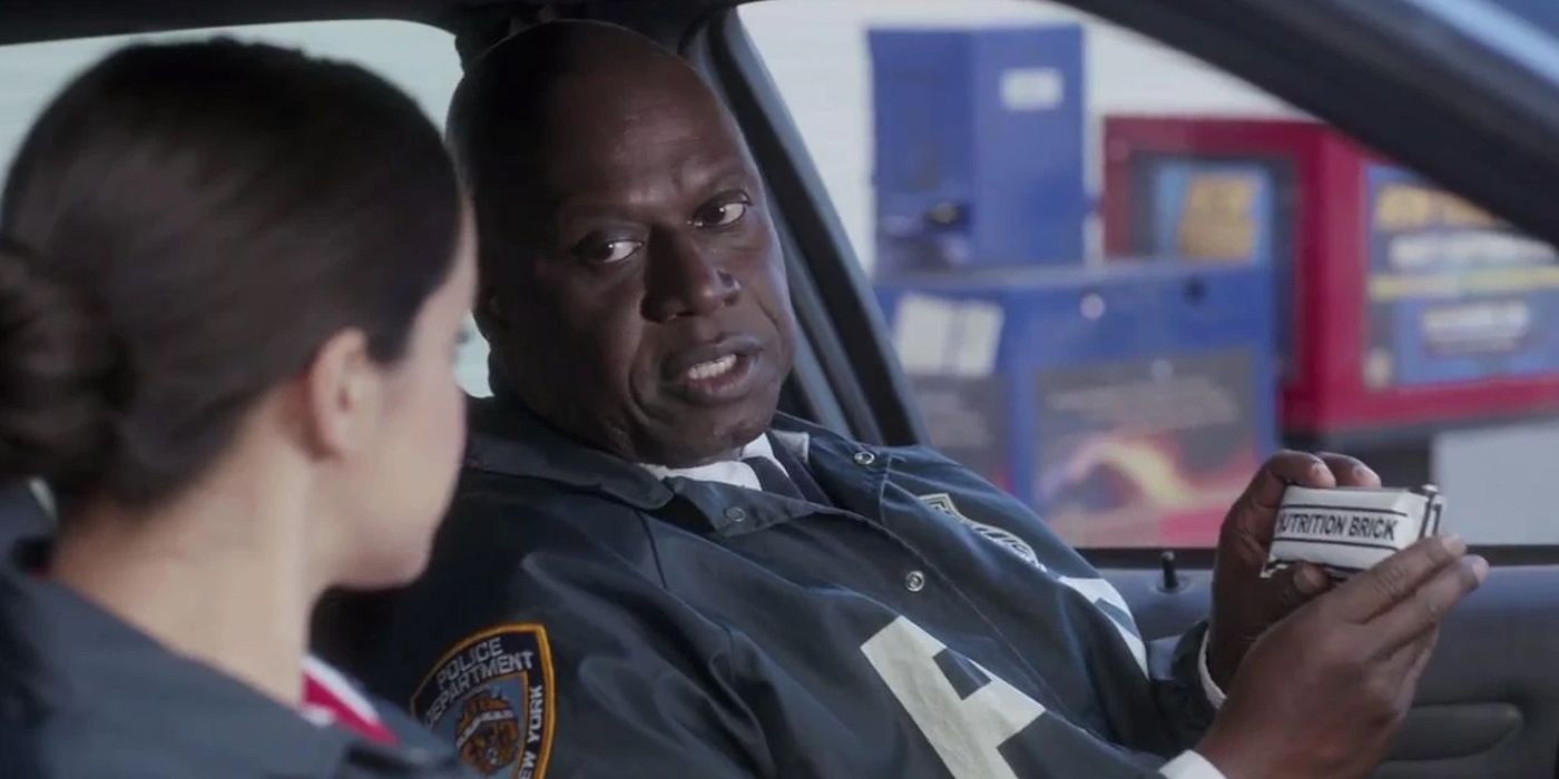 Captain Holt and Amy Santiago in a car in Brooklyn Nine-Nine with Holt holding up a Nutrition Brick bar