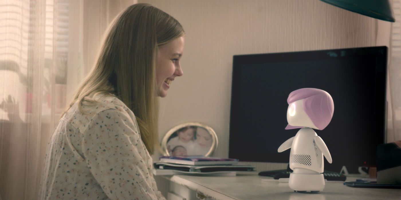 Rachel smiles at an artificially intelligent Ashley doll in Black Mirror
