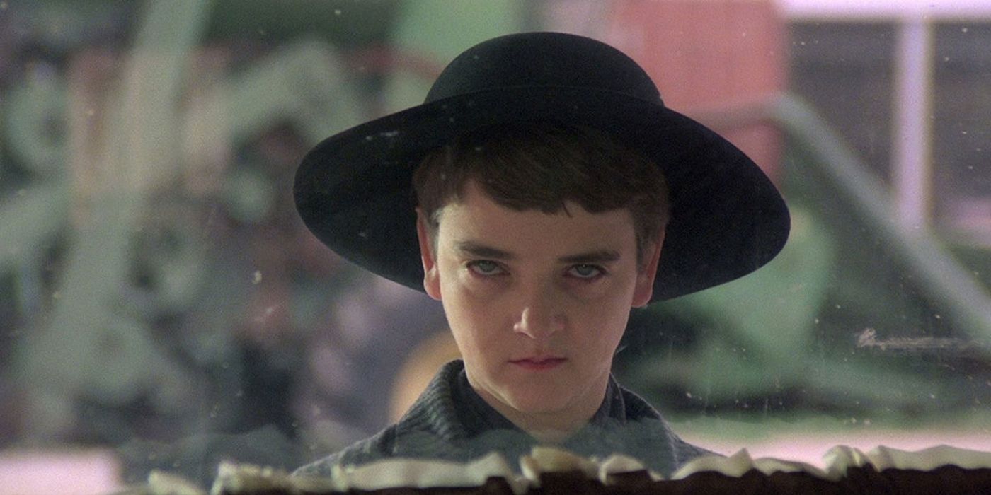 Isaac looking in the diner in Children of the Corn.