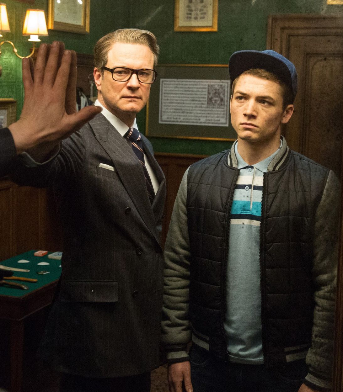 Colin Firth and Taron Egerton in Kingsman vertical