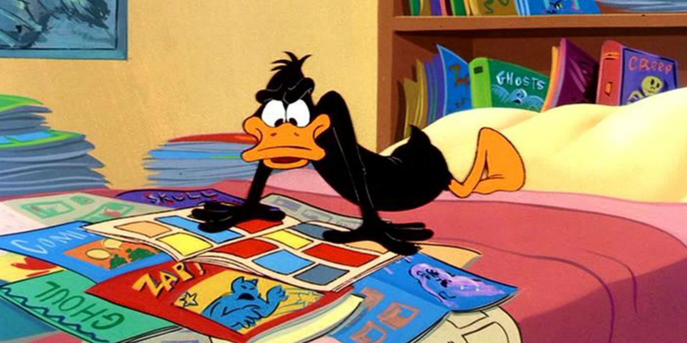 Daffy Duck in bed reading a magazine