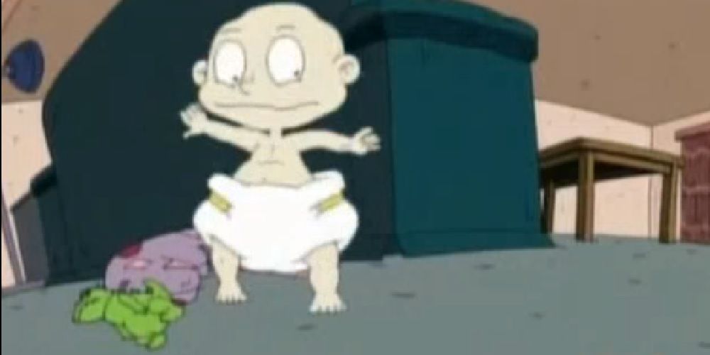 Flashback Tommy Pickles and Reptar doll in Rugrats