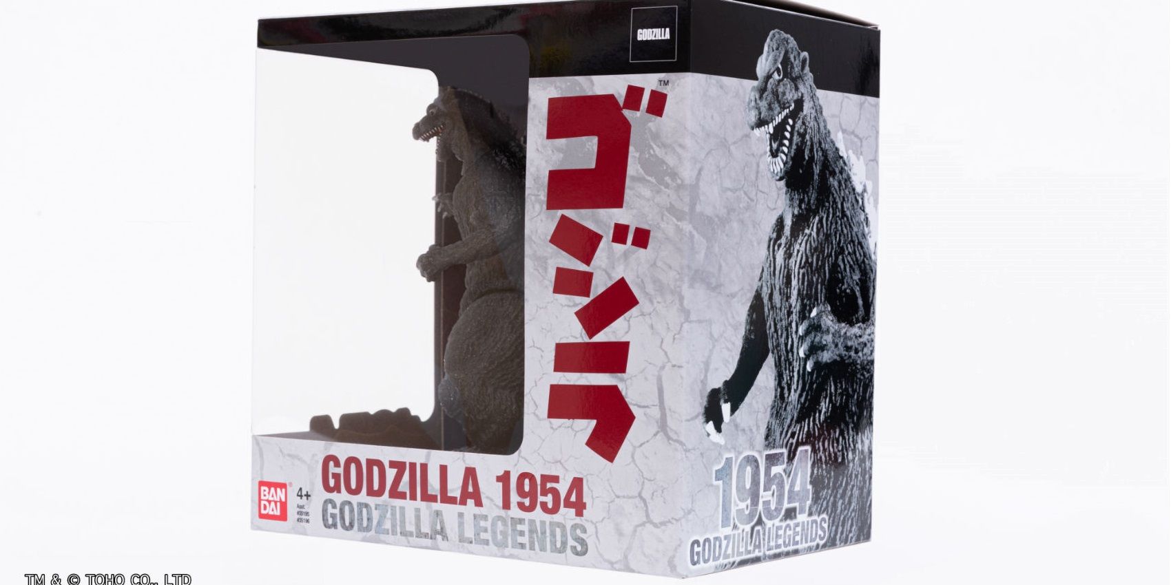 Godzilla SDCC figure stands in box side view