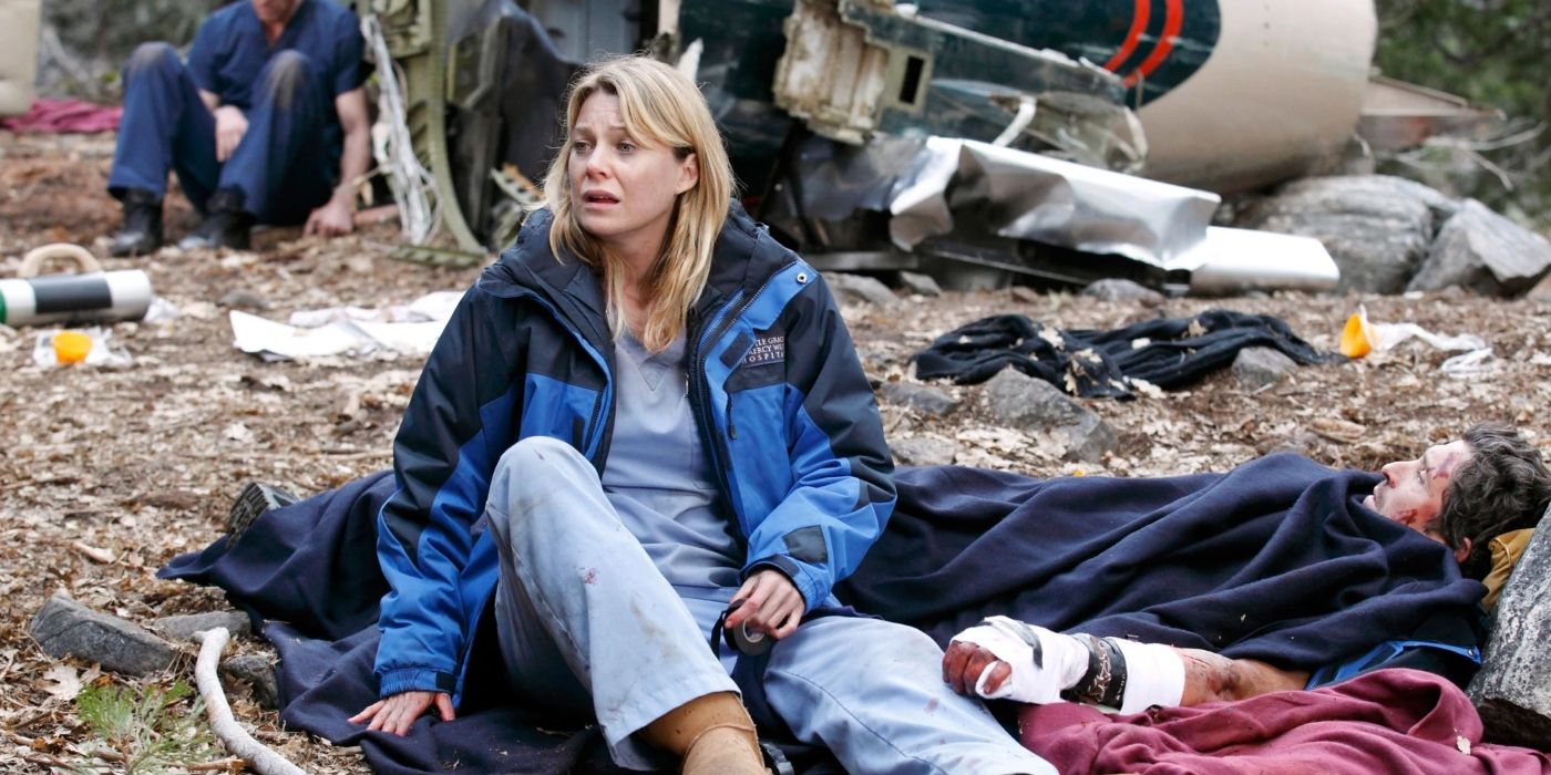 Meredith sitting among the wreckage of the plane crash on Grey's Anatomy 