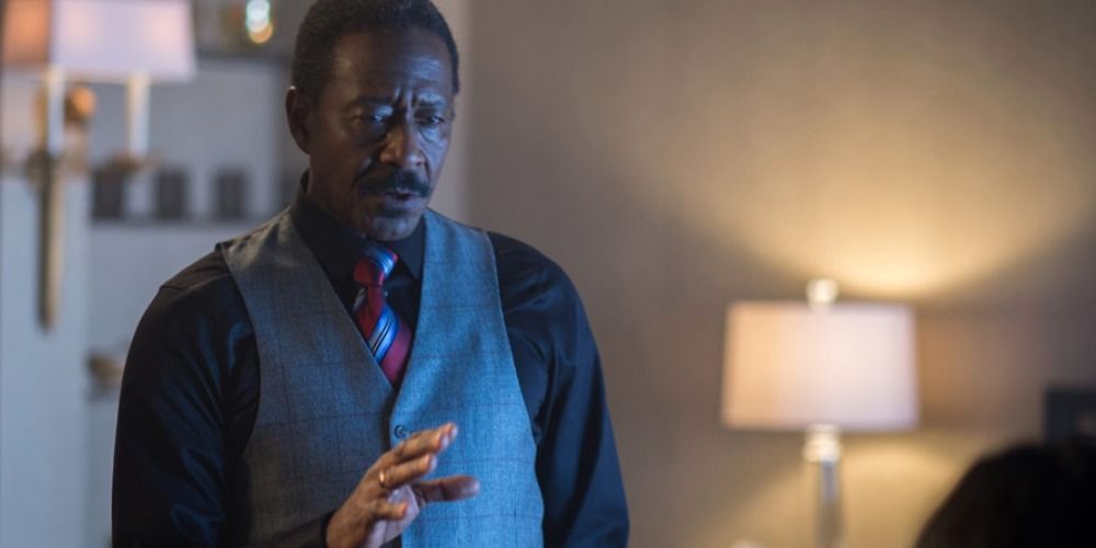 Harry talking in The Continental in John Wick